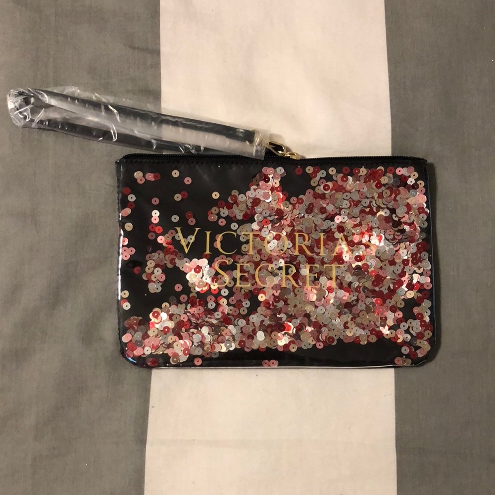 Victoria’s Secret sequin pouch. NWT